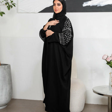 عبايه فري سايز مع شك مع شك على الاكمام مبطنه