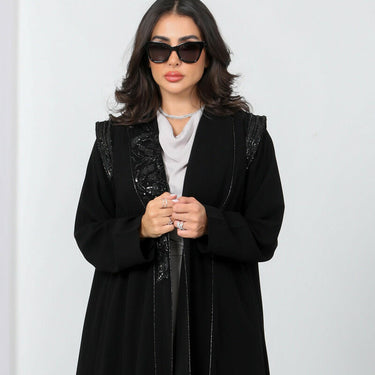 عبايه كريب اسود مع شك اسود