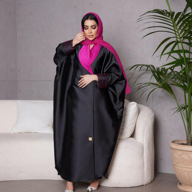 عبايه فري سايز مع شك فوشي على الاكمام