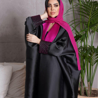 عبايه فري سايز مع شك فوشي على الاكمام