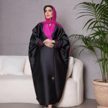 عبايه فري سايز مع شك فوشي على الاكمام