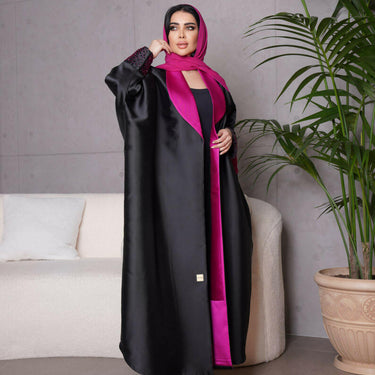 عبايه فري سايز مع شك فوشي على الاكمام